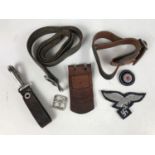 Sundry German badges, a helmet strap etc