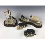 A Border Fine Arts shepherd and sheep dog figurine, a Border Fine Arts sheep dog and sheep figural