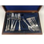 A mahogany canteen and sundry Walker & Hall A1 electroplate King's Pattern cutlery