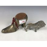Two Edwardian electroplate pin cushions, one modelled as a shoe, the other a lion
