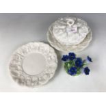 A Victorian Minton type Parian ware butter dish and stand, and one further stand, design