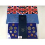 Four vintage coin sets including 'Britain's first decimal coins', 'Coins of Great Britain' and Royal