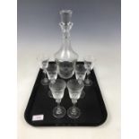 A glass decanter together with six matching sherry / liqueur glasses