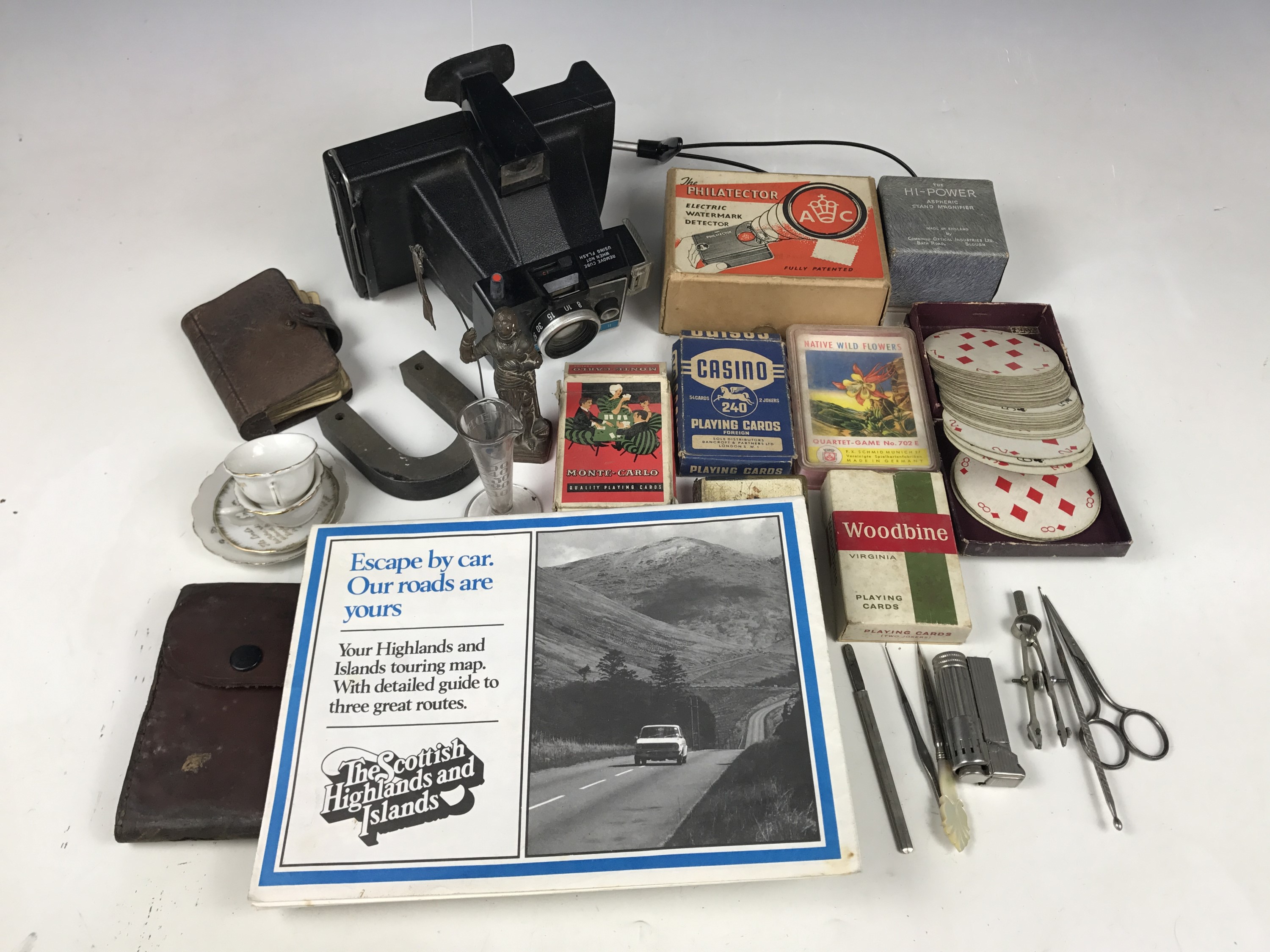 Sundry collectors' items including a Polaroid Colorpack II land camera, maps, playing cards, a cased