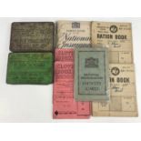 Two Second World War British military anti-gas ointment tins, together with sundry ration books, and