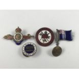 An enamelled white metal ensign brooch, together with sundry enamel badges and brooches