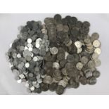 A large quantity of USA quarter dollar and ten cents coins