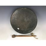 A large copper gong drum