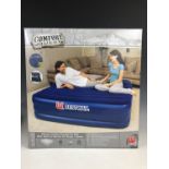 A Bestway deluxe comfort flocked air bed with built-in electric air pump, 80 x 62 x 22 inches