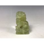 A diminutive Chinese jade temple lion