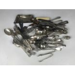A quantity of electroplate cutlery including ladles, sugar tongs and a crumb tray etc