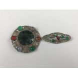 A white metal Celtic plaid brooch set with moss agate together with a costume enamelled bird brooch