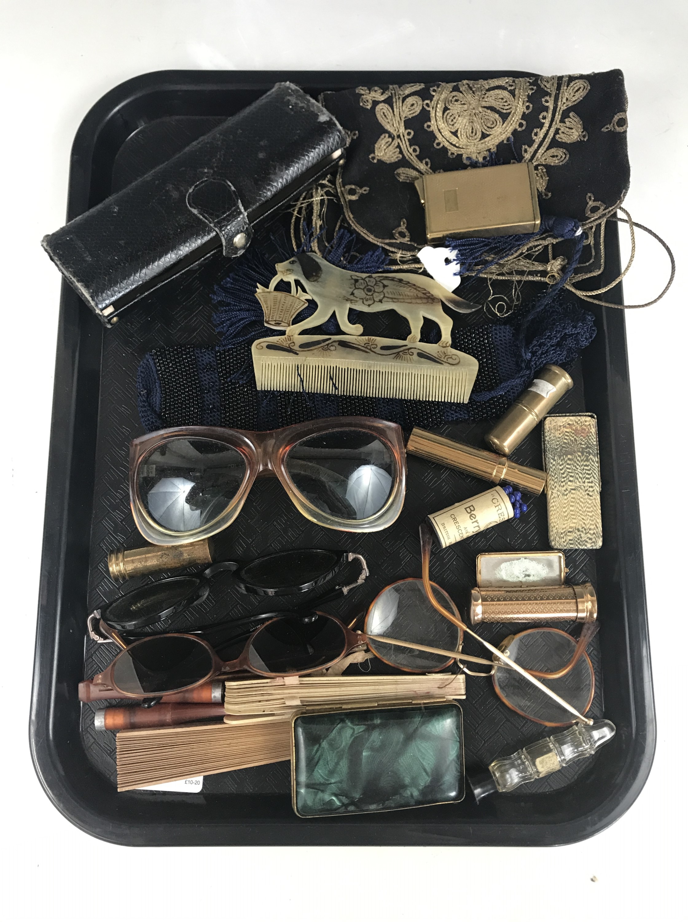 Vintage costume accessories including sunglasses, a reticule, vintage lipsticks and a horn comb