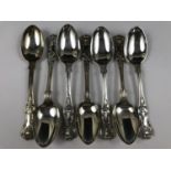 A heterogenous set of seven silver King's Pattern tea spoons, 261 g