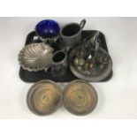 A quantity of electroplate including an egg cruet, a sugar and creamer, a pair of bottle coasters