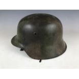 A German M. 1942 helmet, (a/f)