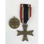 A German Third Reich War Merit medal and War Merit Cross