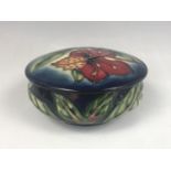 A Moorcroft "Simeon" pattern covered box designed by Philip Gibson, impressed and painted marks to