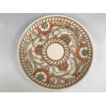 A 1930s Charlotte Rhead for Crown Ducal "Tudor Rose" pattern charger, pattern No. 4491, 32 cm