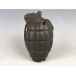 A 1917 No 36 (Mills) grenade converted to a money box