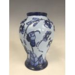 A Moorcroft Florian "Echo" pattern blue-on-blue inverted baluster vase designed by Carole Lovett,