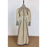 A late Victorian lady's eau-de-nile cotton cord and turquoise velvet walking / promenade dress, of