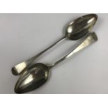 Two Georgian silver Old English pattern table spoons, each having the letter 'H' engraved to the