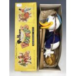 A boxed Pelham Donald Duck puppet