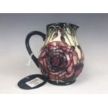 A Moorcroft The Connoisseur Collection "Eustoma" pattern baluster jug designed by Carole Lovatt,