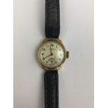 A 1930s lady's 9ct gold cased Rotary wrist watch, having a circular silvered dial, gilt Arabic