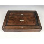 A Victorian mahogany writing slope, having white-metal stringing and mother of pearl inlay,