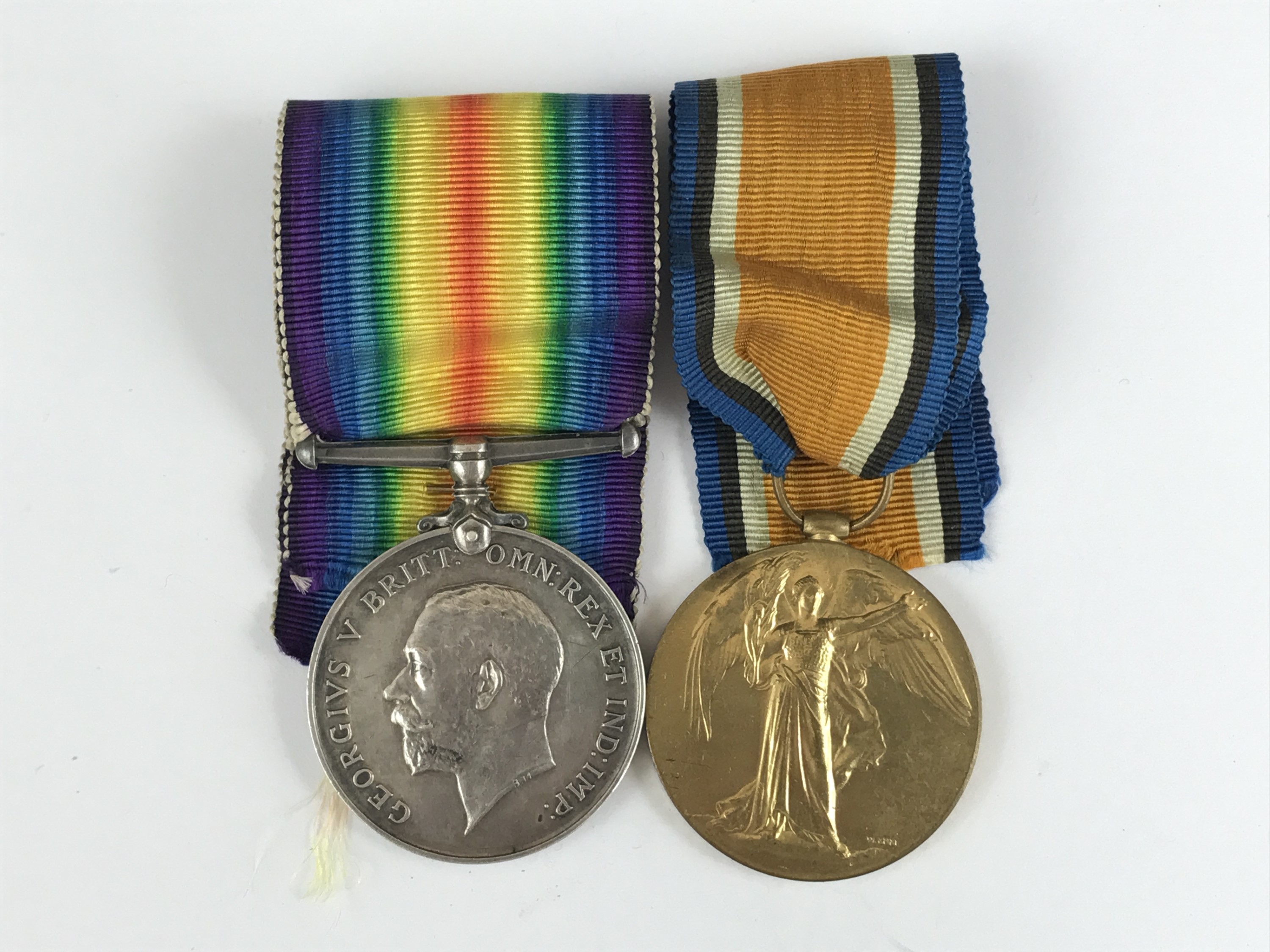 A British War and Victory medal to 119508 Pte J Findlay, MGC