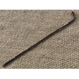 A Victorian palm wood sword stick, having white metal pommel, the lozenge-section blade bearing