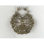 A Gordon Highlanders bonnet badge