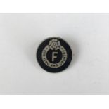 A British Union of Fascists member's For King and Country lapel badge