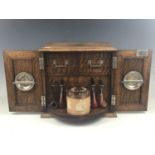 A Victorian smokers' oak compendium, with presentation plaque "To Robert Scott Esq from Rochdale and