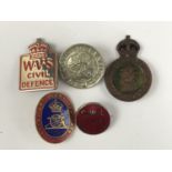 A group of Second World War lapel badges including Catholic Women's League 1940-1941 Canteen and