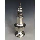 A George V silver caster, of octagonal-section shouldered baluster form, Barker Brothers, Chester,