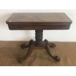 A William IV mahogany turn-over-top tea table