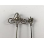 Two Edwardian Charles Horner silver ribbon and ball hat pins, Chester, 1907 and 1908