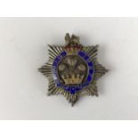 A 1927 Royal Masonic Institute for Girls enamelled silver badge
