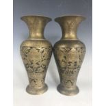 A pair of 19th Century Indian Moradabad brass flower vases, 26 cm