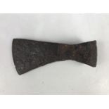 A Medieval iron axe head, 18 cm