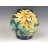 A limited edition Moorcroft "Topeka" pattern oblate form vase designed by Jeanne McDougall,