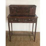 A late 19th / early 20th Century Sheraton revival string-inlaid and cross-banded mahogany bonheur du