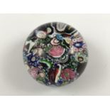 A 19th Century Clichy millefiore scrambled cane paperweight, 6 cm