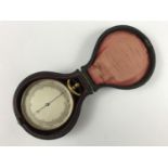 A late 19th Century cased pocket aneroid barometer
