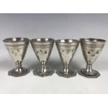 Two pairs of Ottoman white metal zarfs, with glass liners, bearing struck tughra and other marks, (