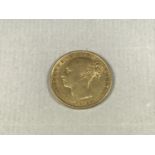 An 1872 gold sovereign