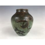 A WMF Ikora patinated brass vase, of inverted baluster form, decorated with dendritic tendrils and